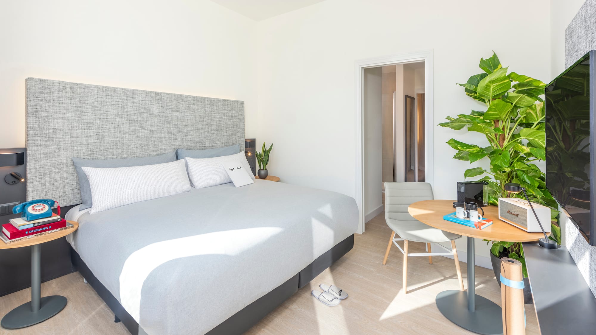 a room with a bed and a table