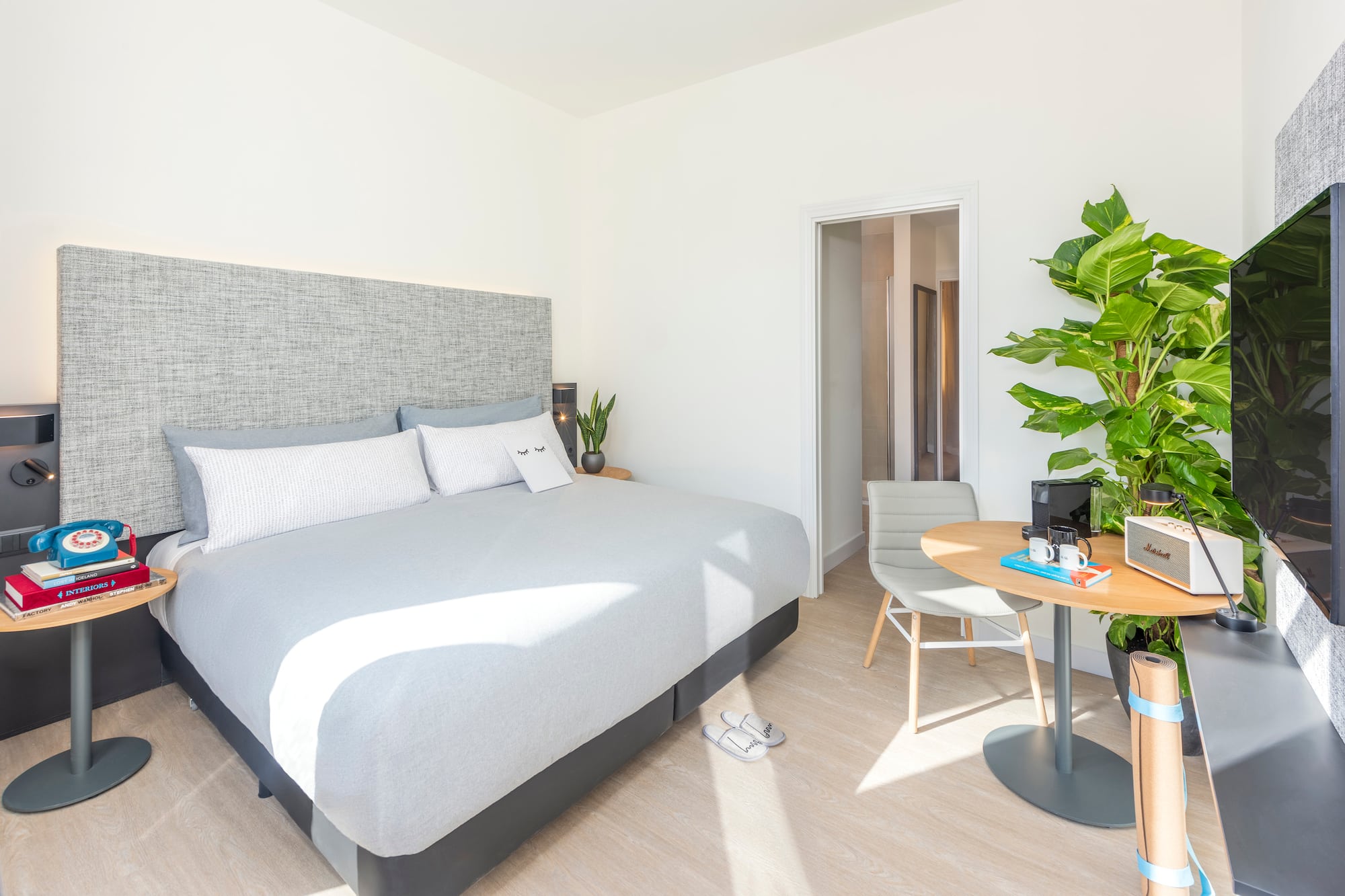 a room with a bed and a table