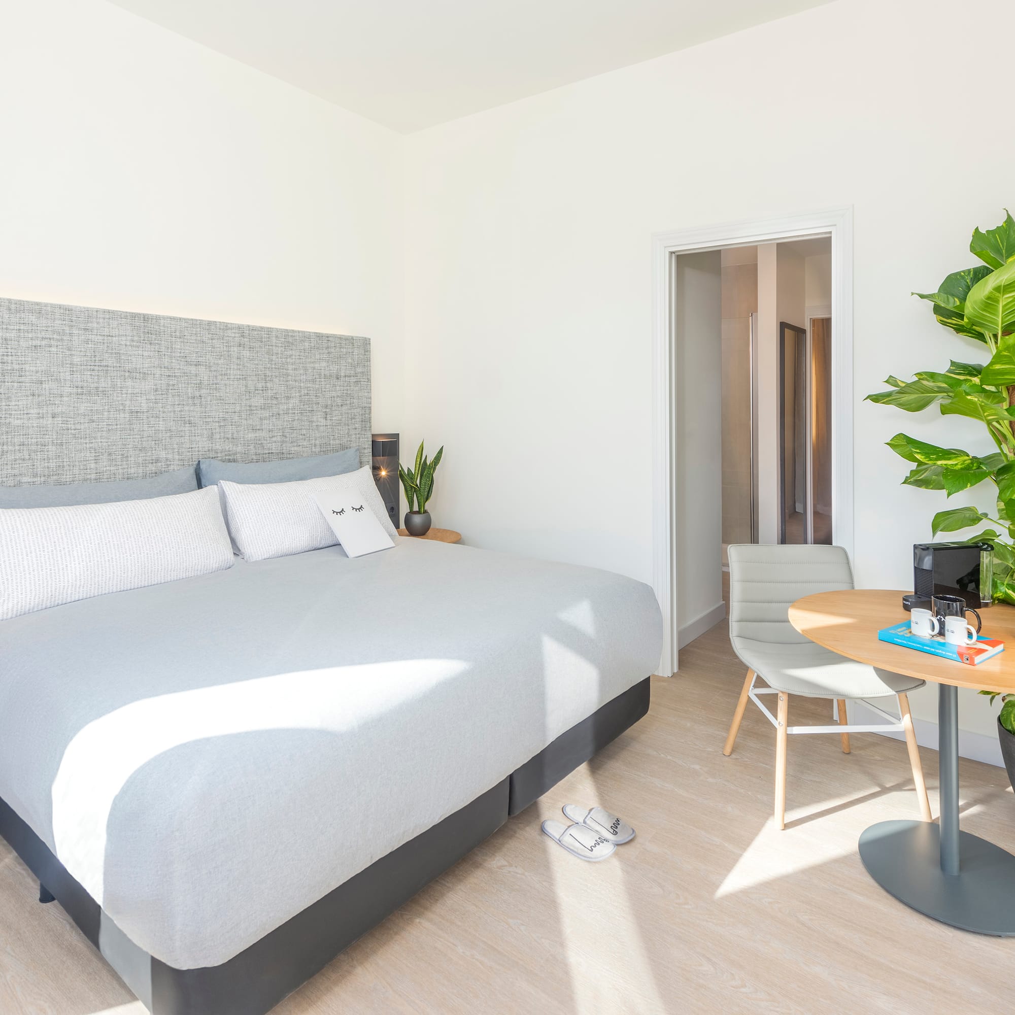 a room with a bed and a table