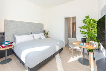 a room with a bed and a table