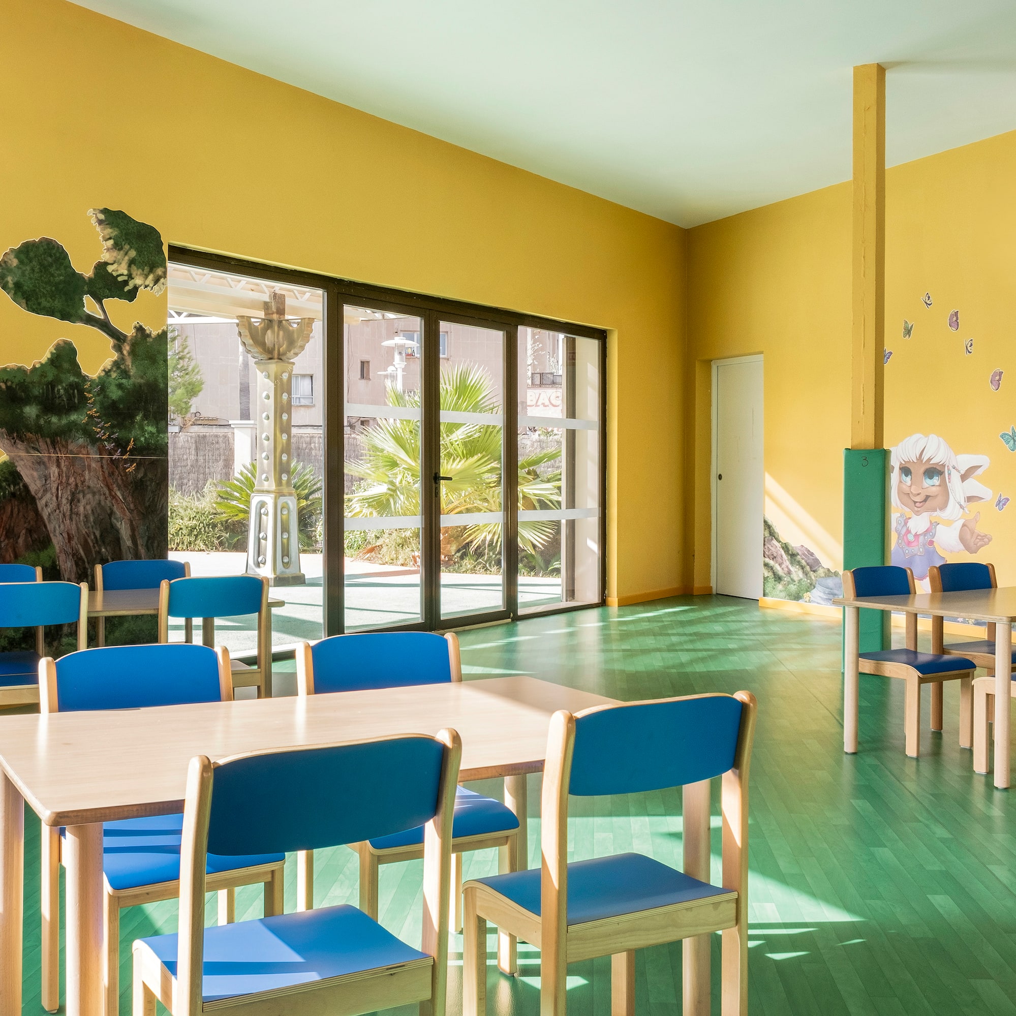 a room with tables and chairs