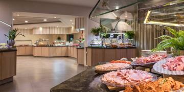 a buffet with food on the counter