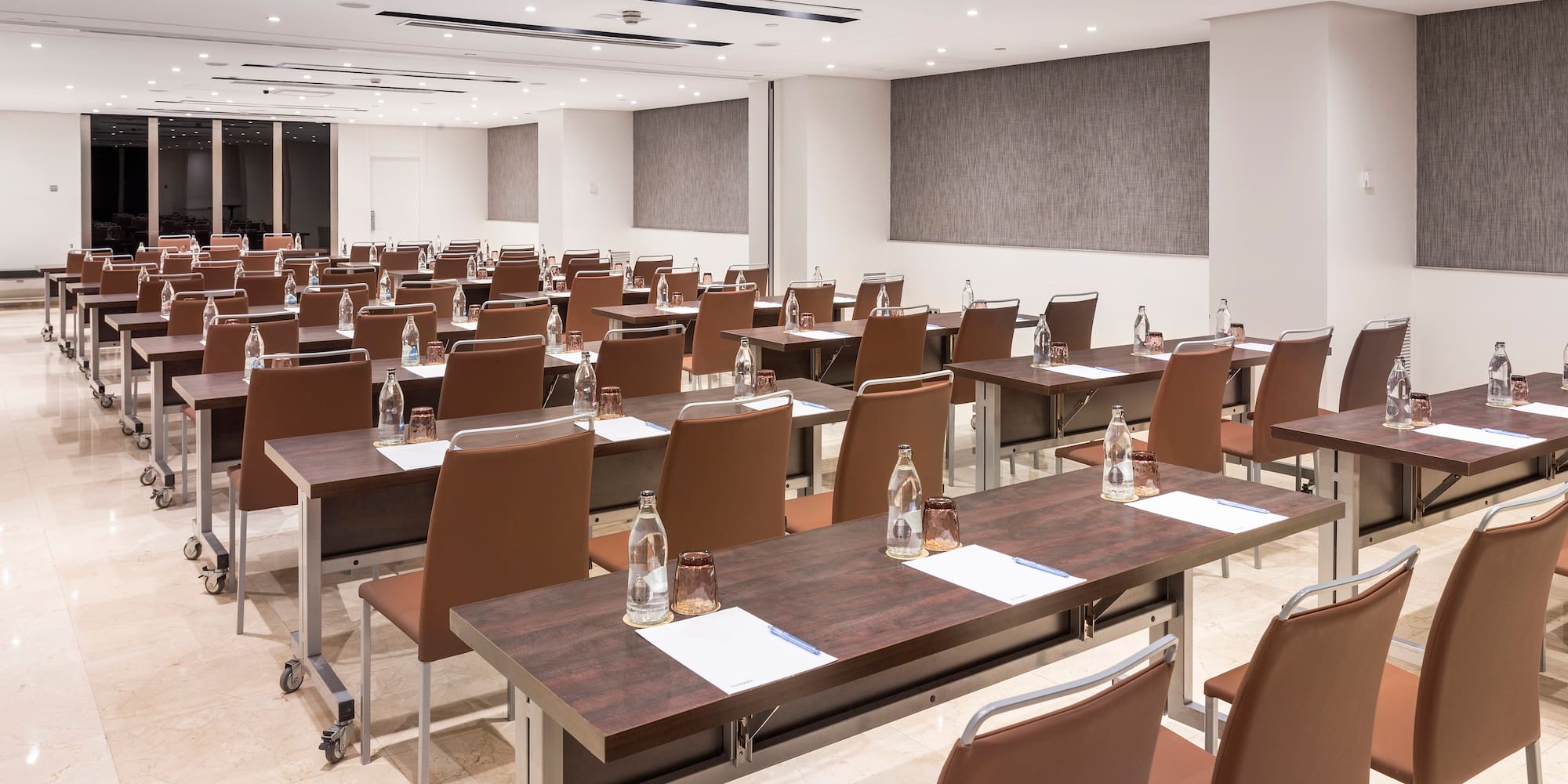 a room with tables and chairs