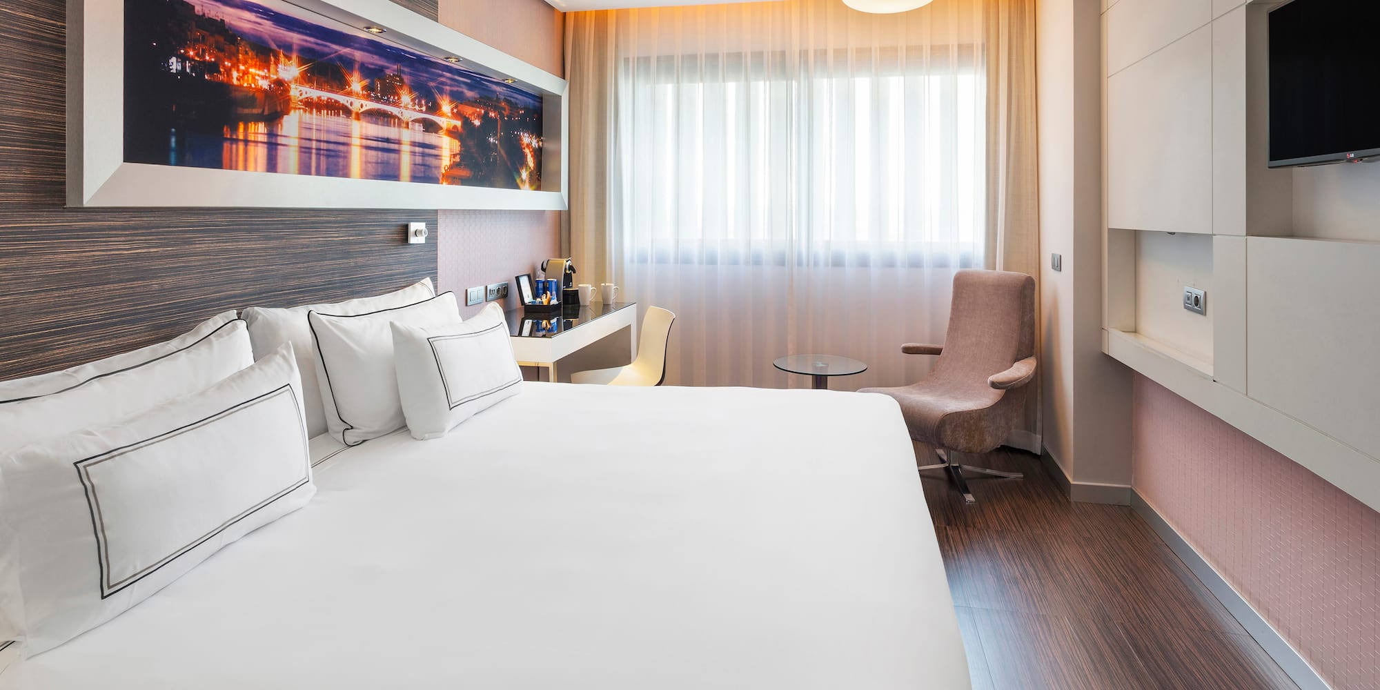 a room with a bed and a chair