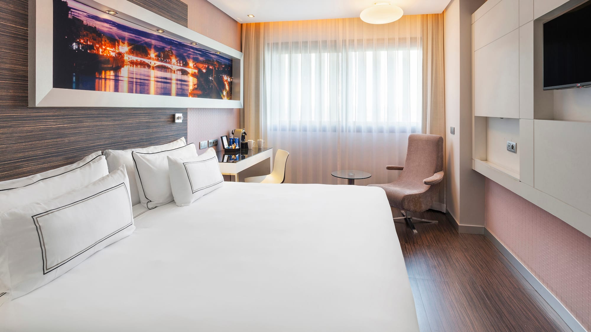 a room with a bed and a chair