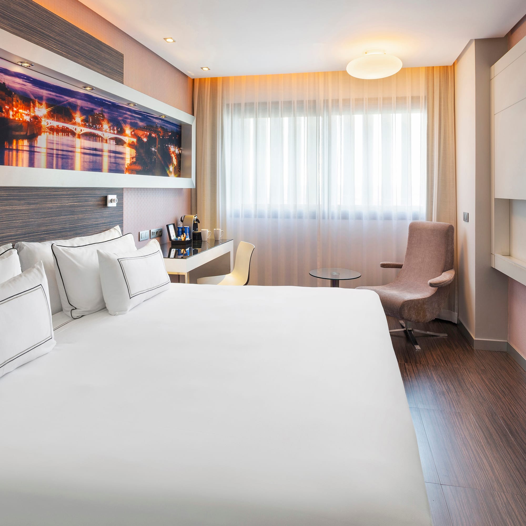 a room with a bed and a chair