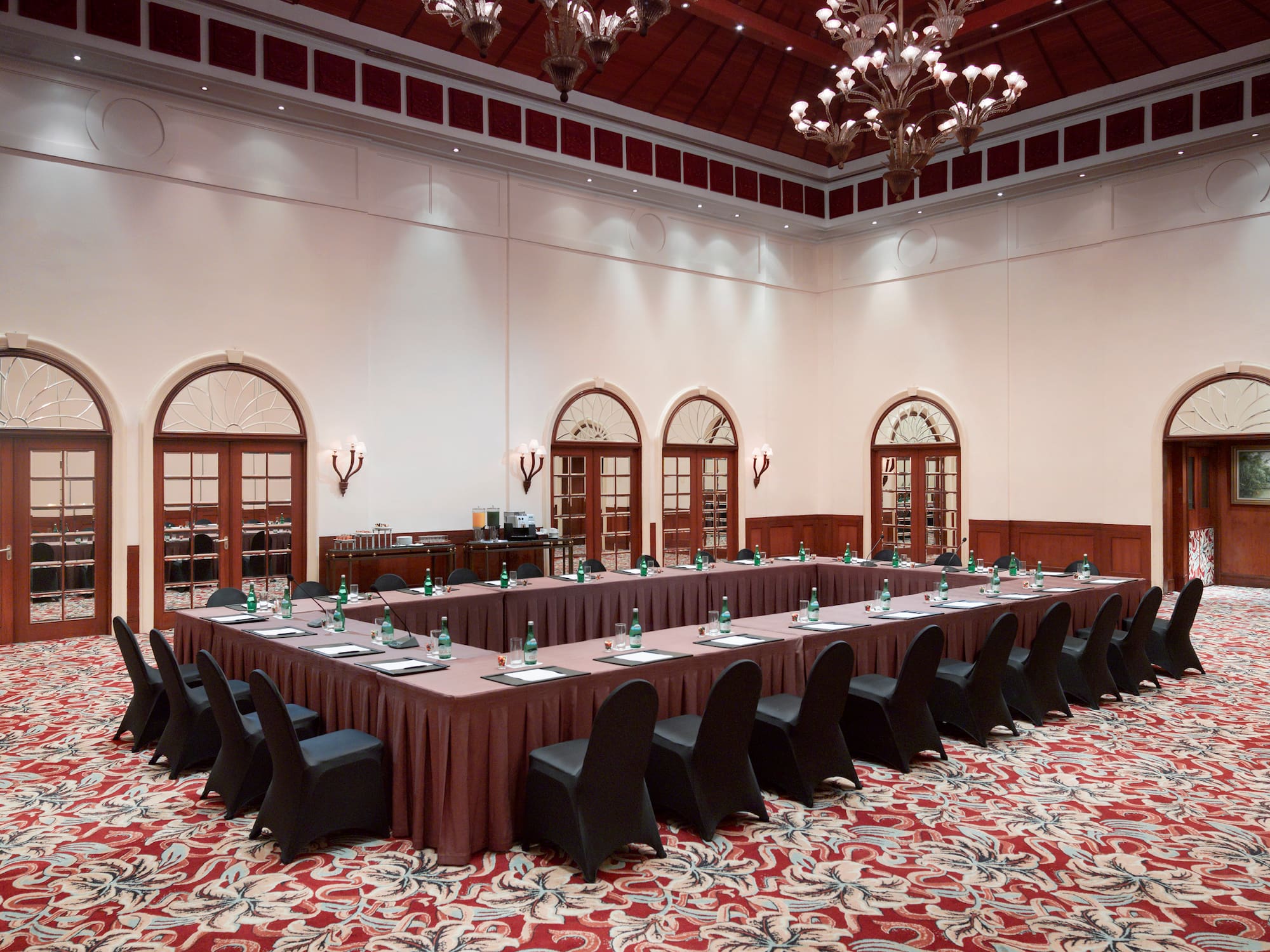 a long table with chairs in a room