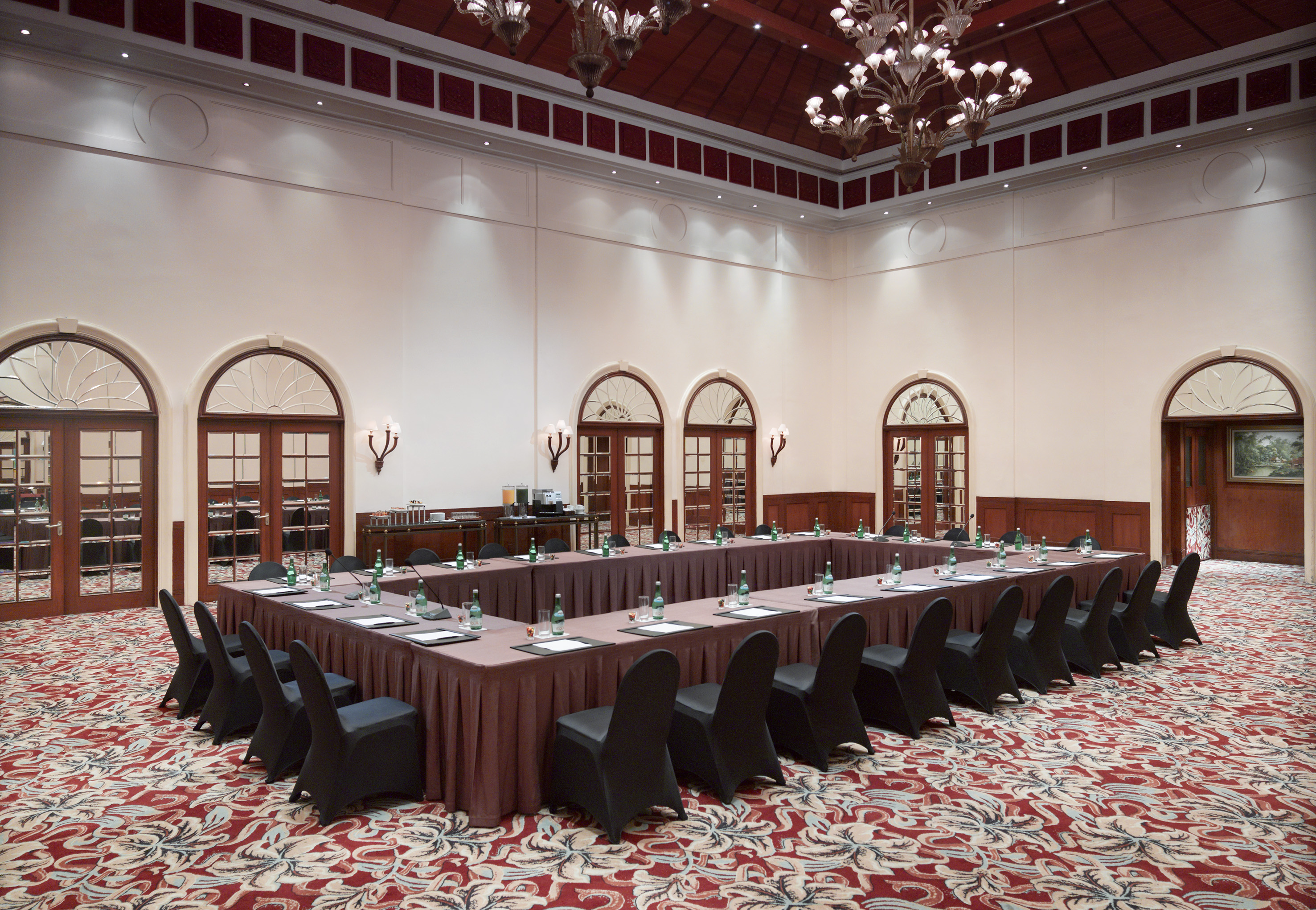 a long table with chairs in a room
