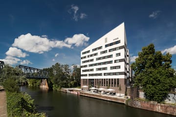 a building next to a river