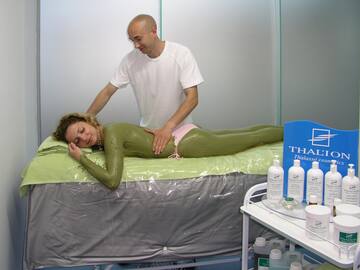 a man massaging a woman's body