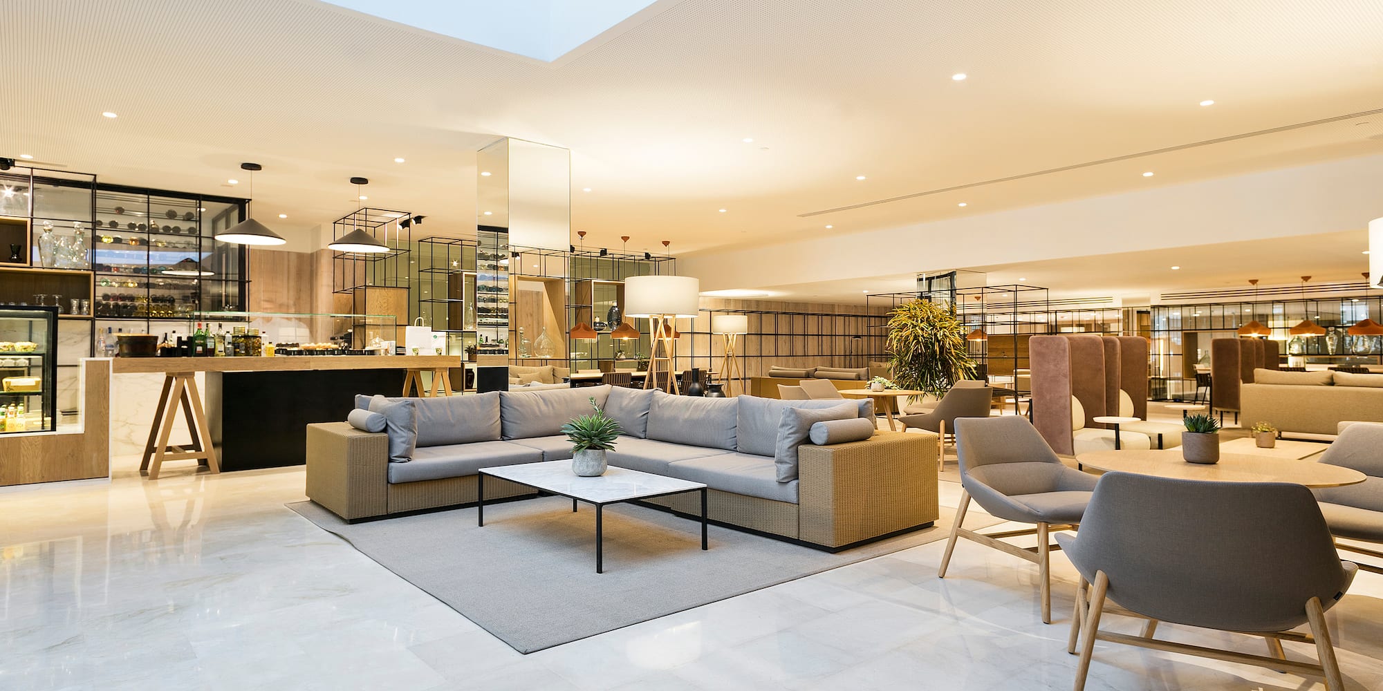 a large room with a couch and chairs