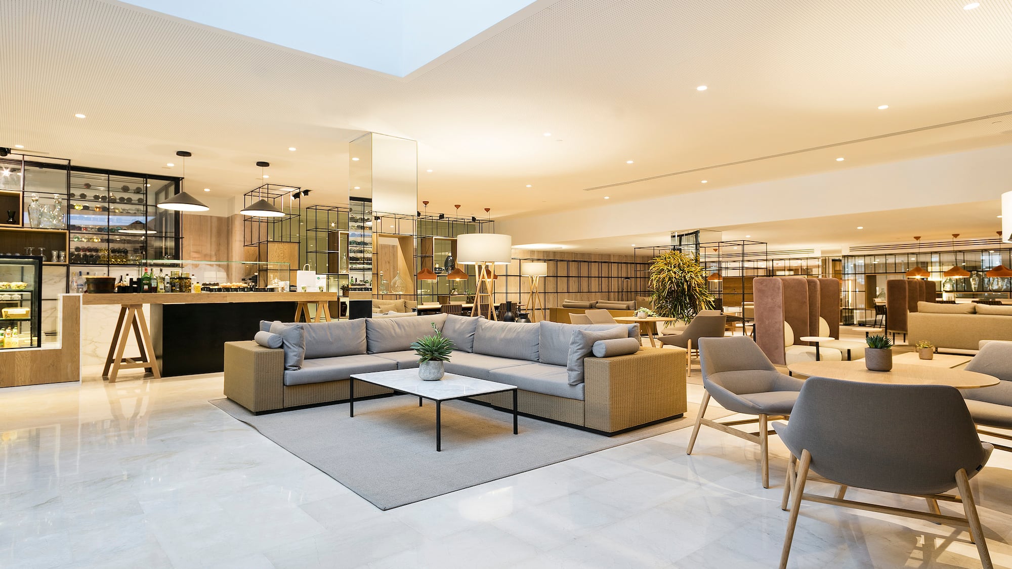 a large room with a couch and chairs