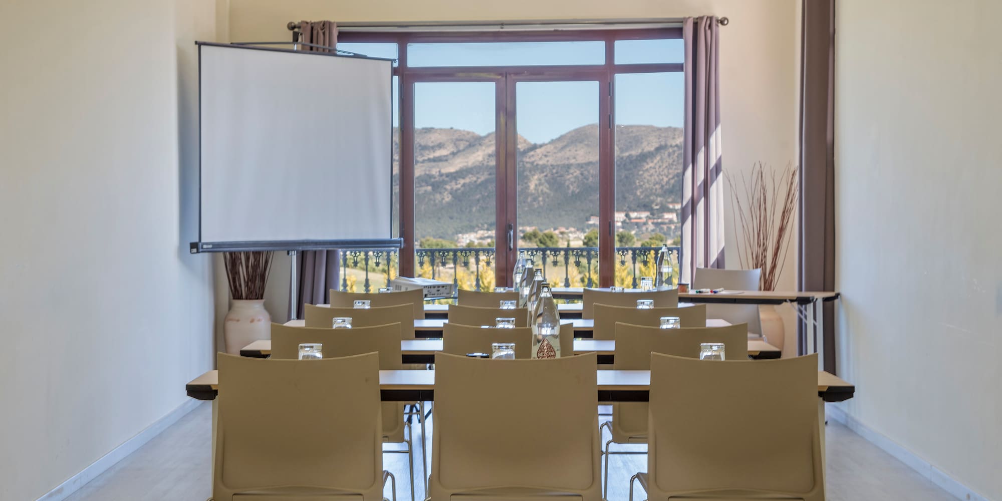 a room with tables and chairs