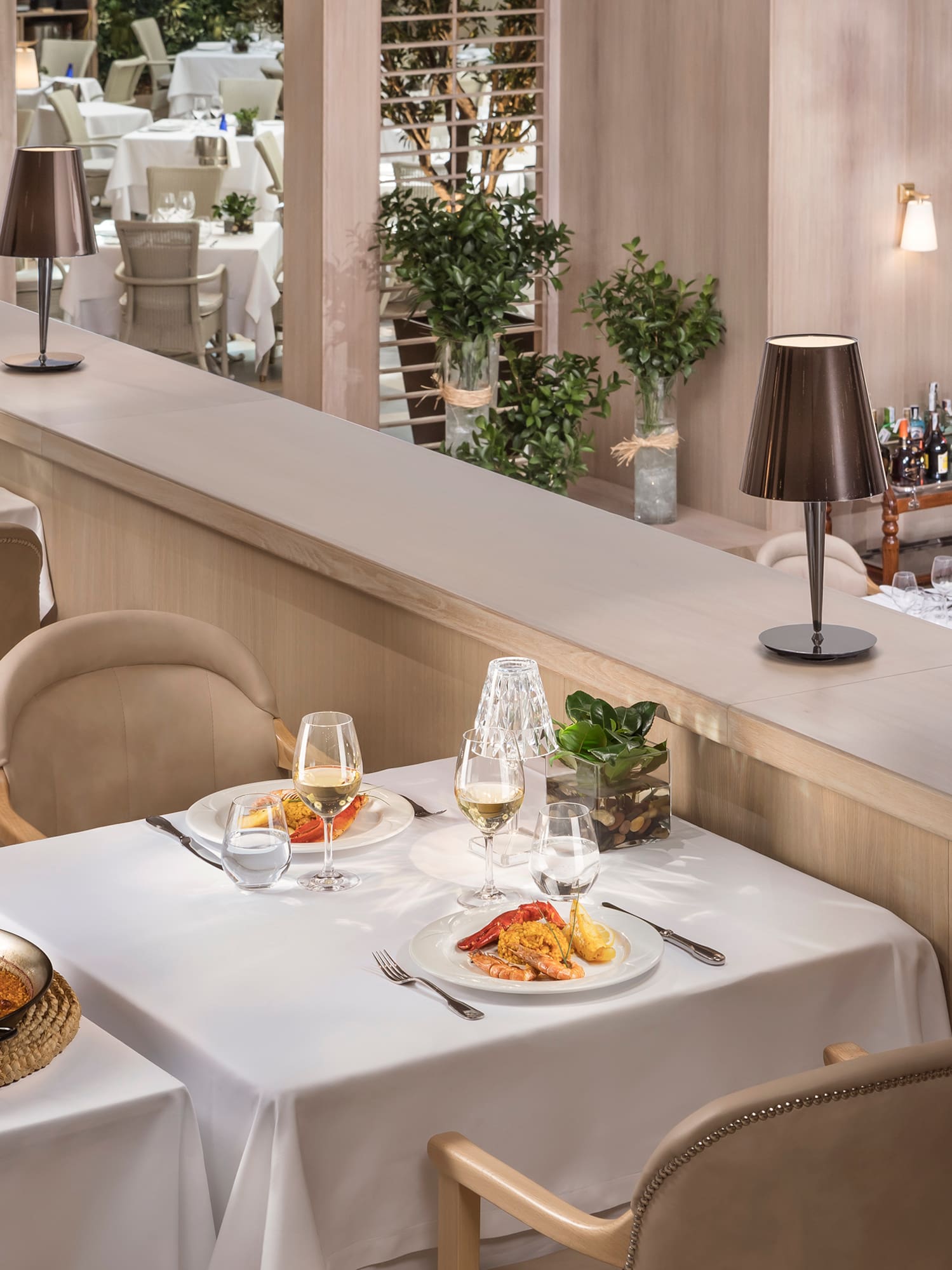 a restaurant with tables and chairs