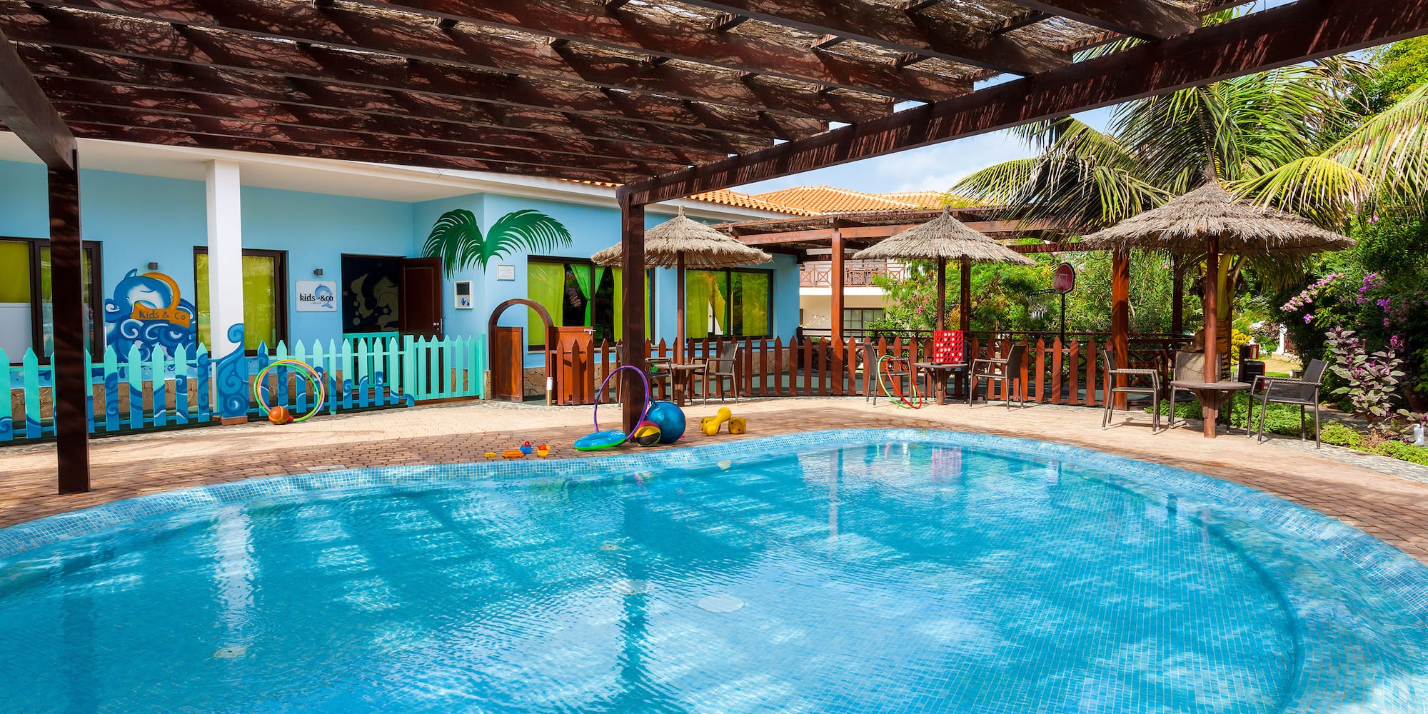 a pool with a wooden roof