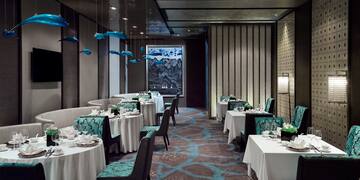 a room with tables and chairs