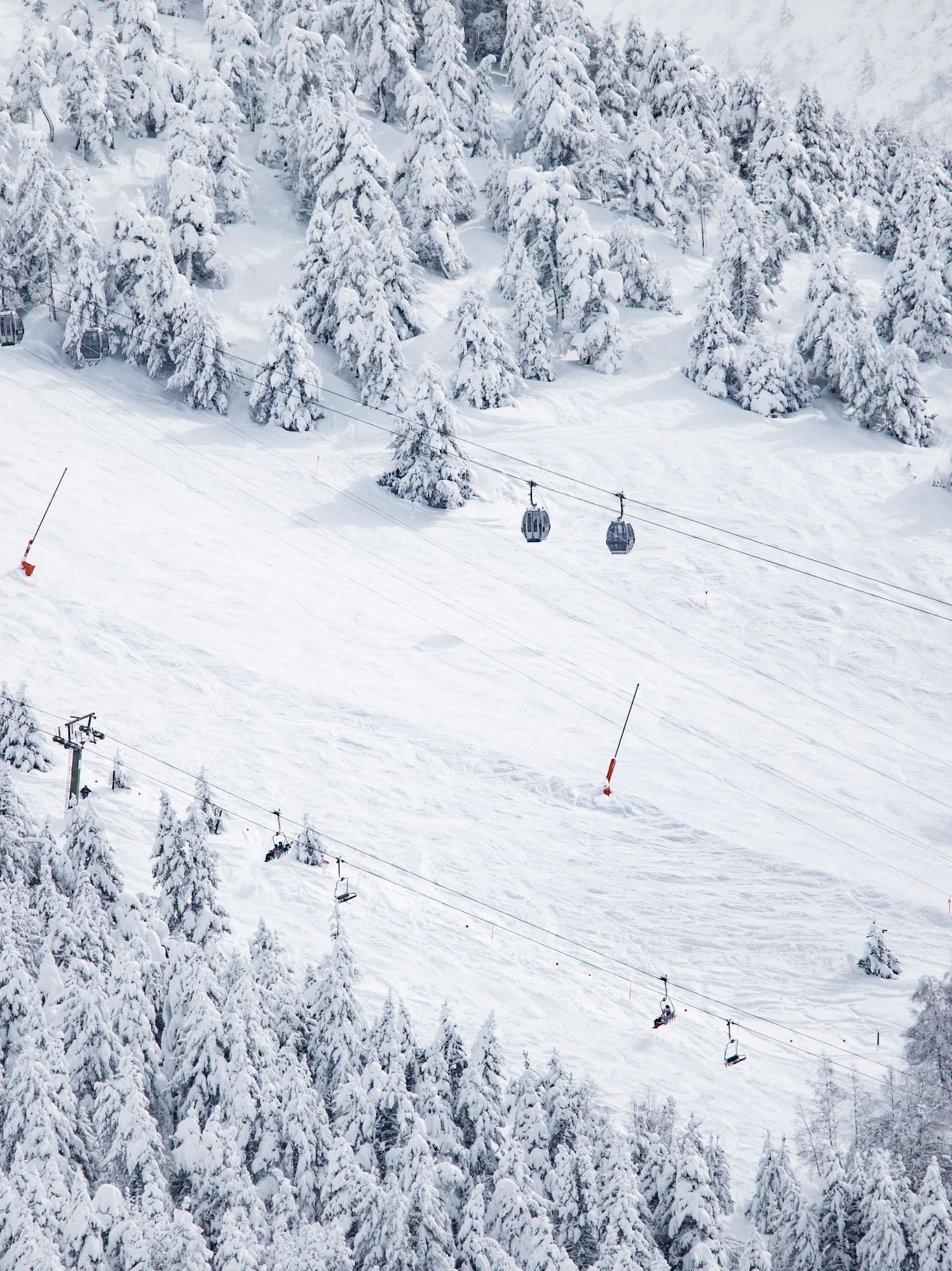 a ski lift on a snowy mountain