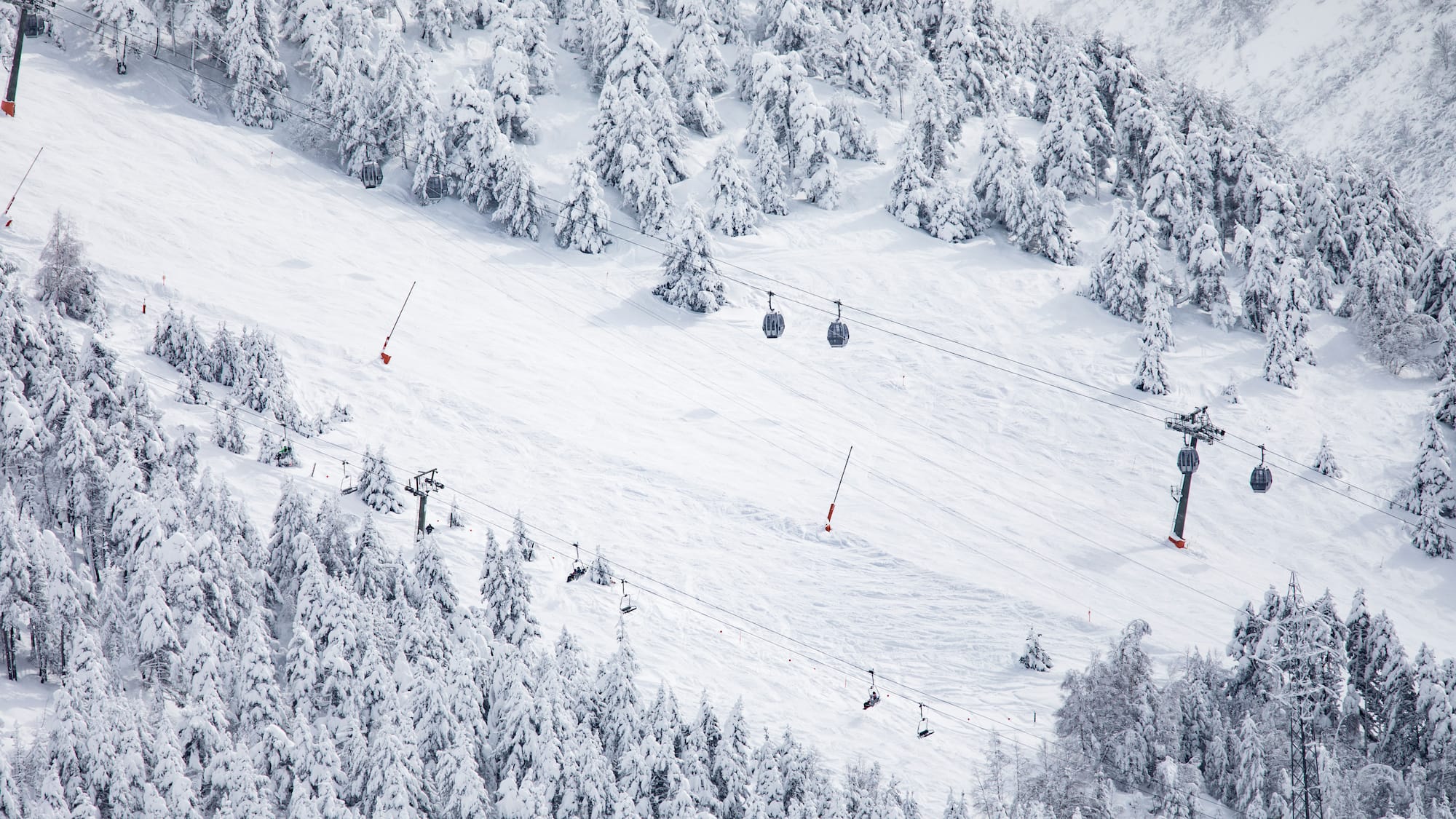 a ski lift on a snowy mountain