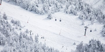 a ski lift on a snowy mountain