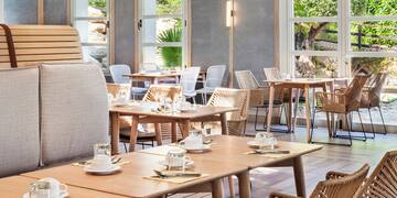 a room with tables and chairs