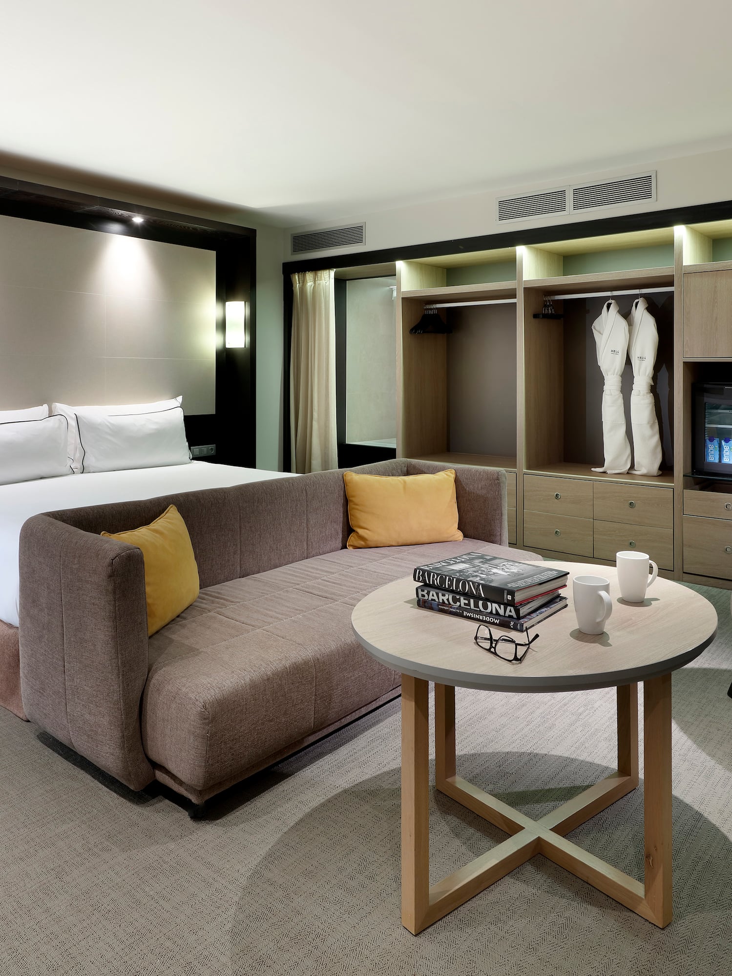 a room with a bed and a couch