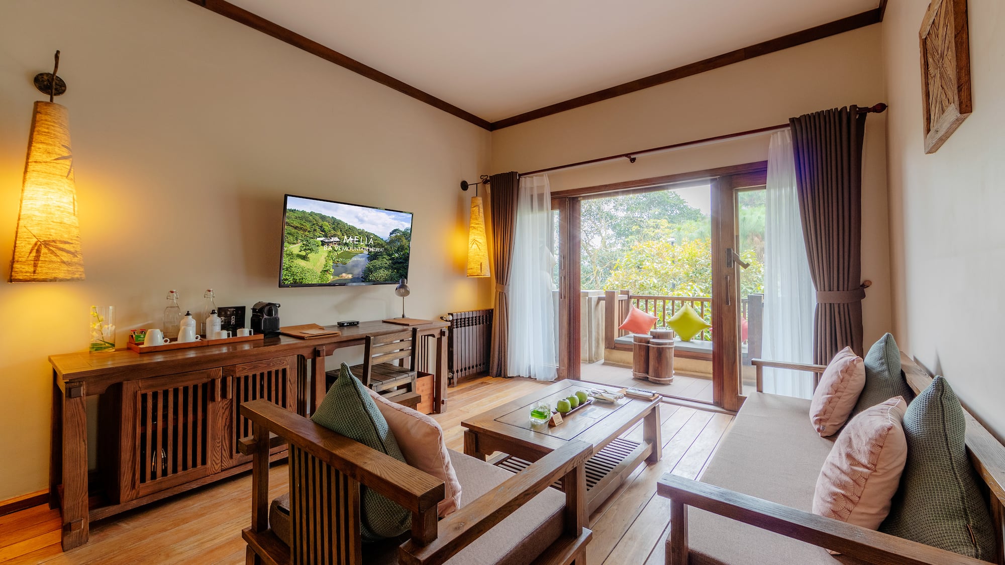 a living room with a television and a television on the wall