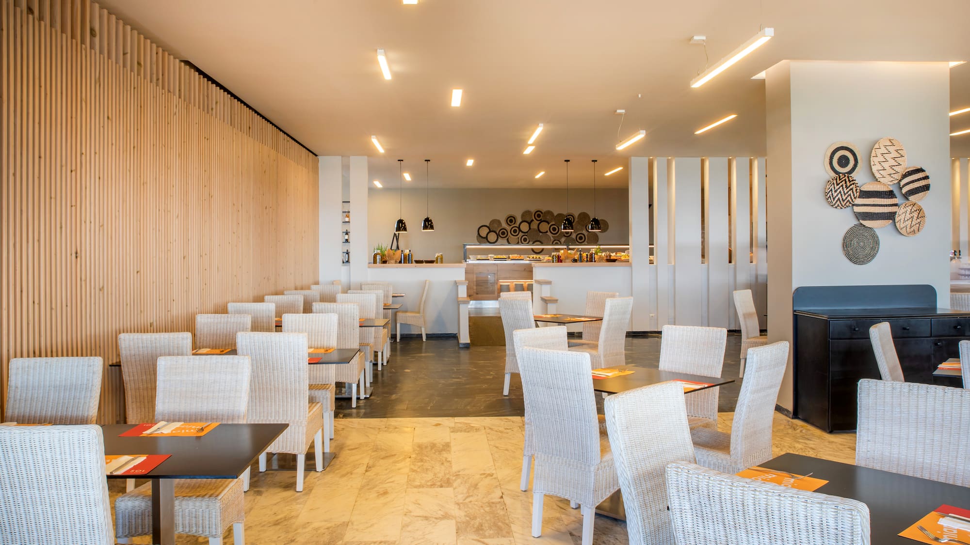 a room with tables and chairs