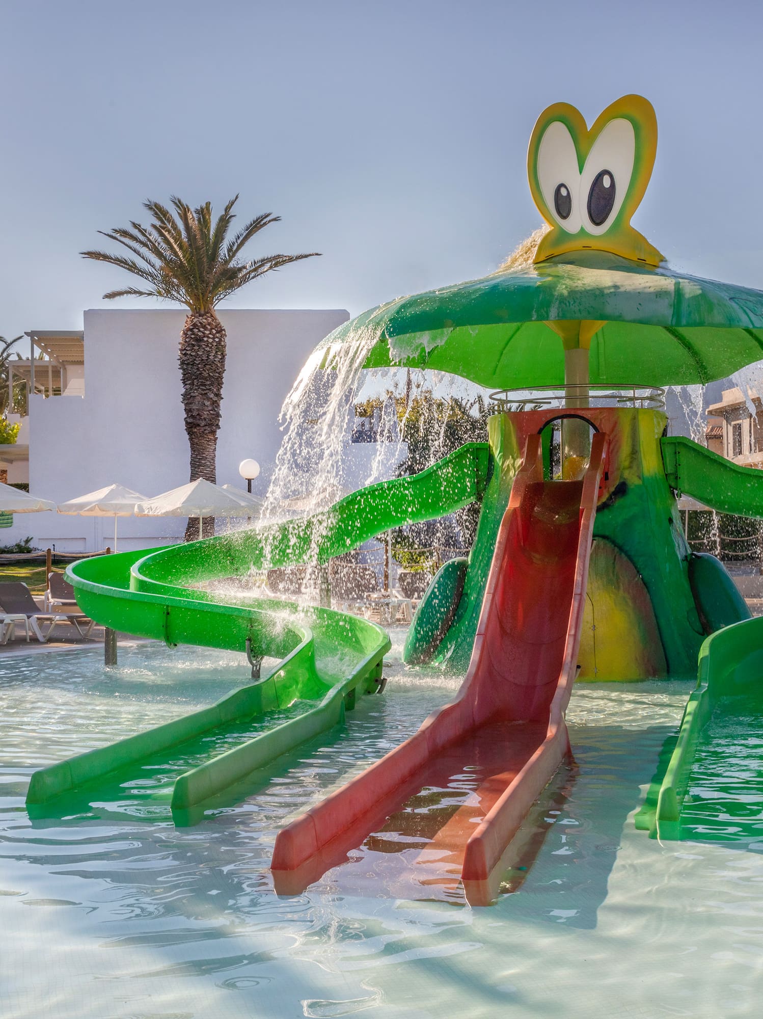 a water slide in a pool