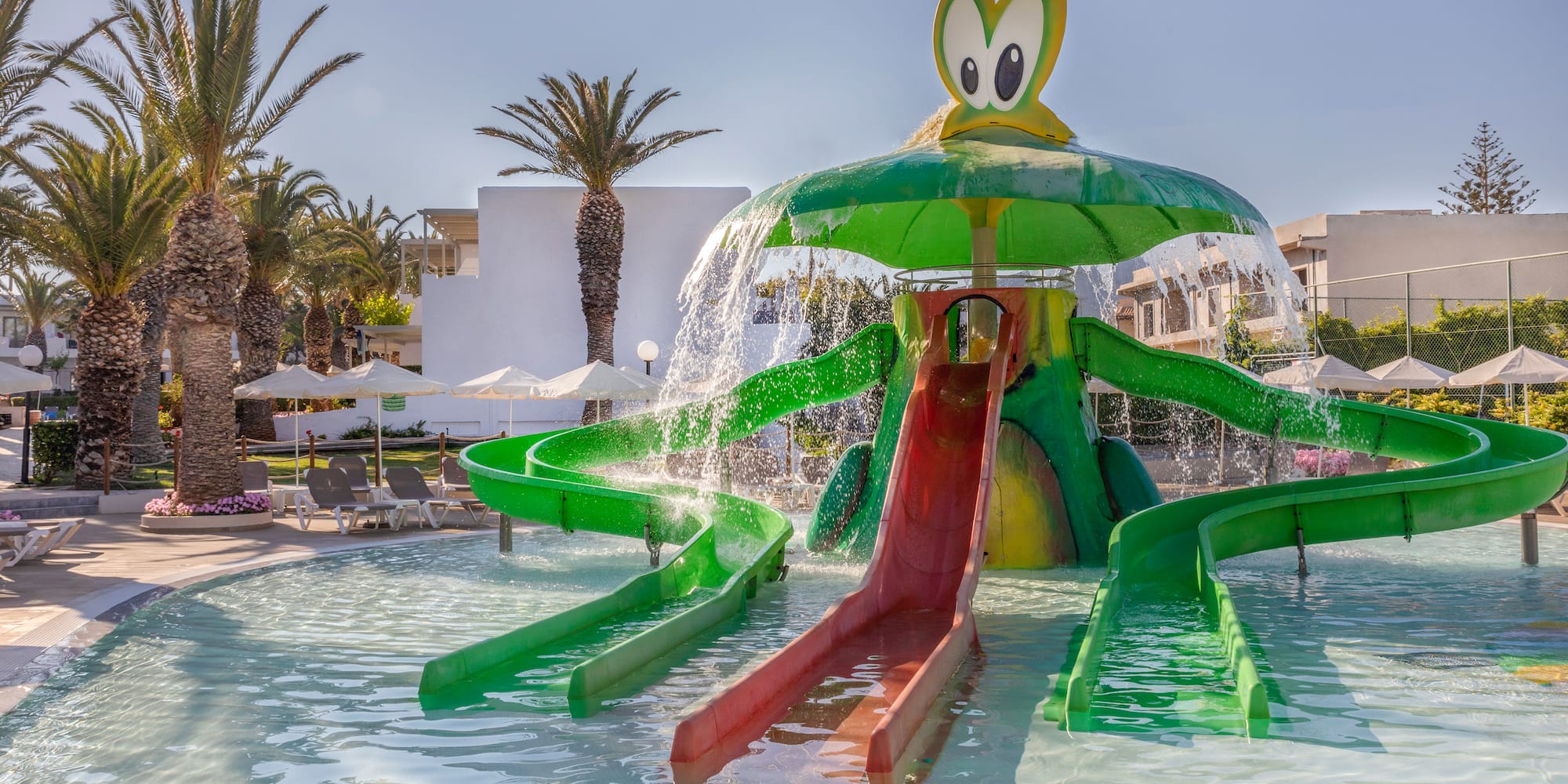 a water slide in a pool