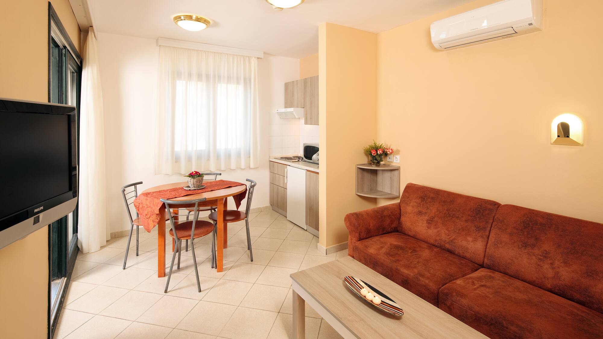 a living room with a couch and table