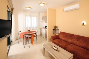 a living room with a couch and table