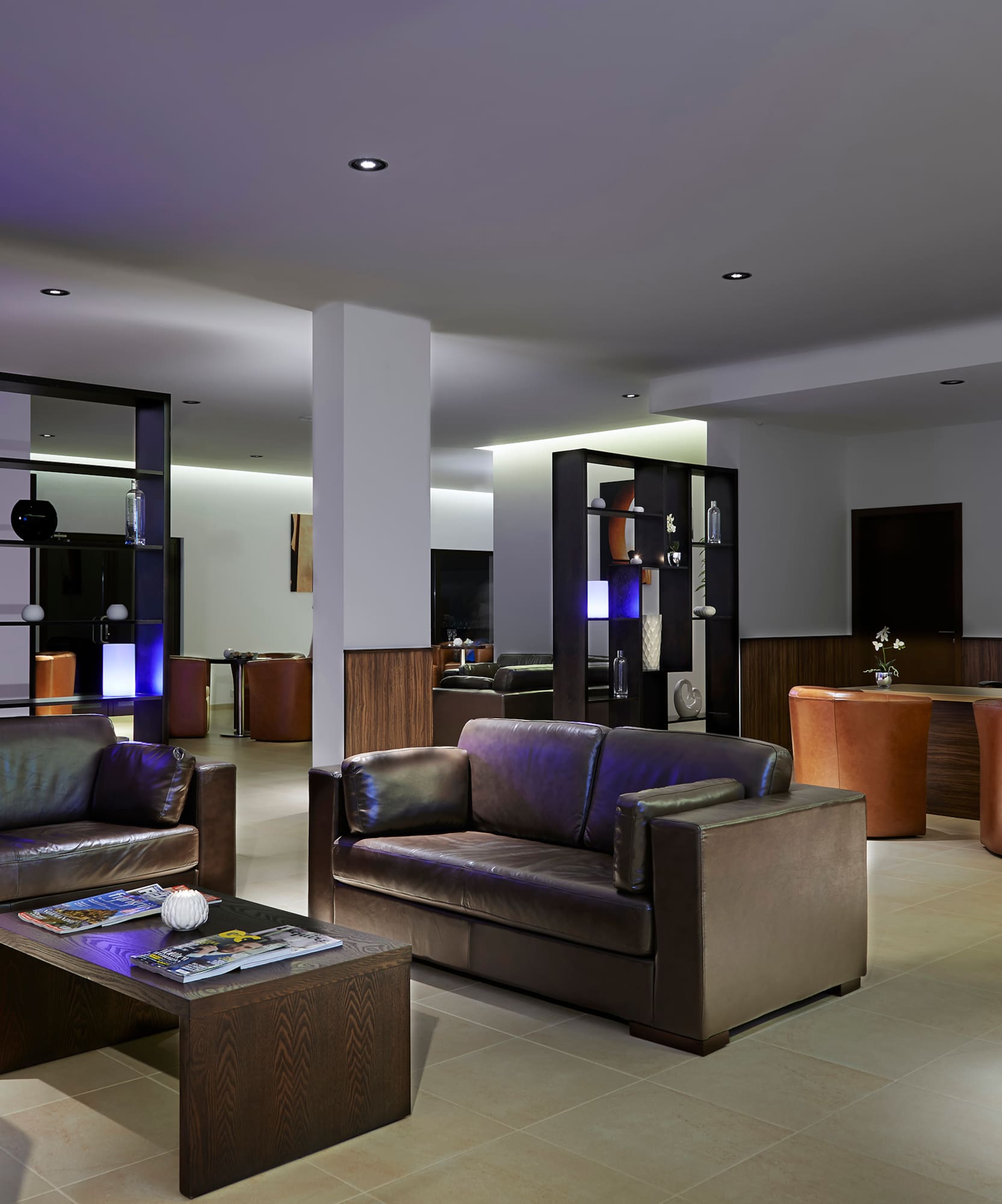 a room with couches and a table