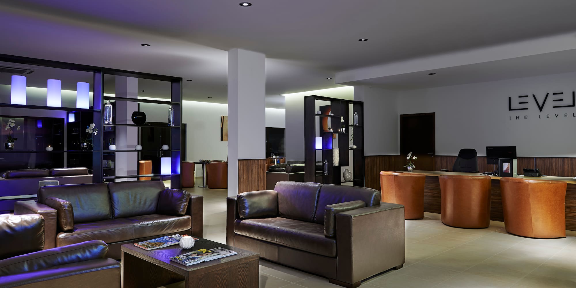 a room with couches and a table