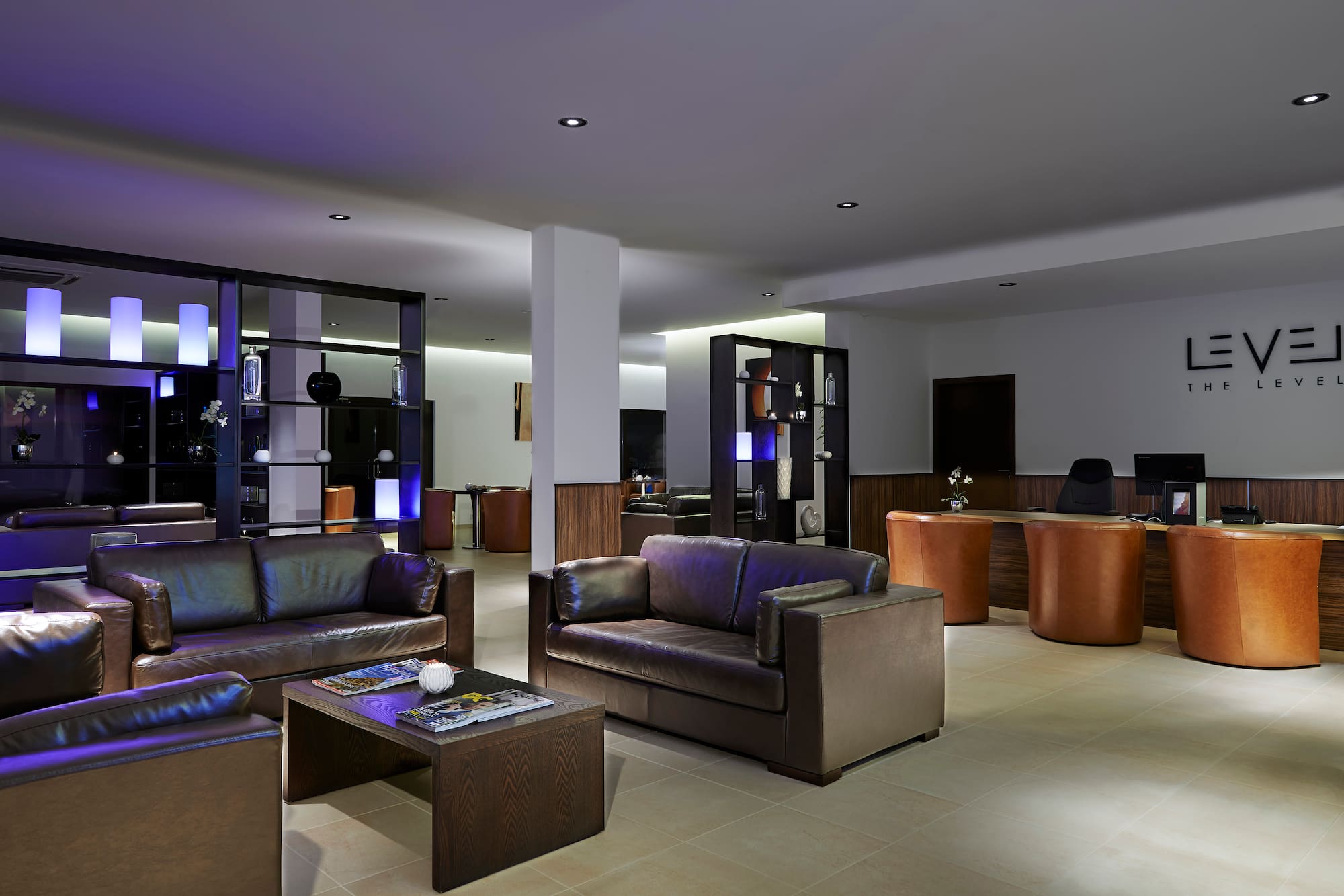 a room with couches and a table