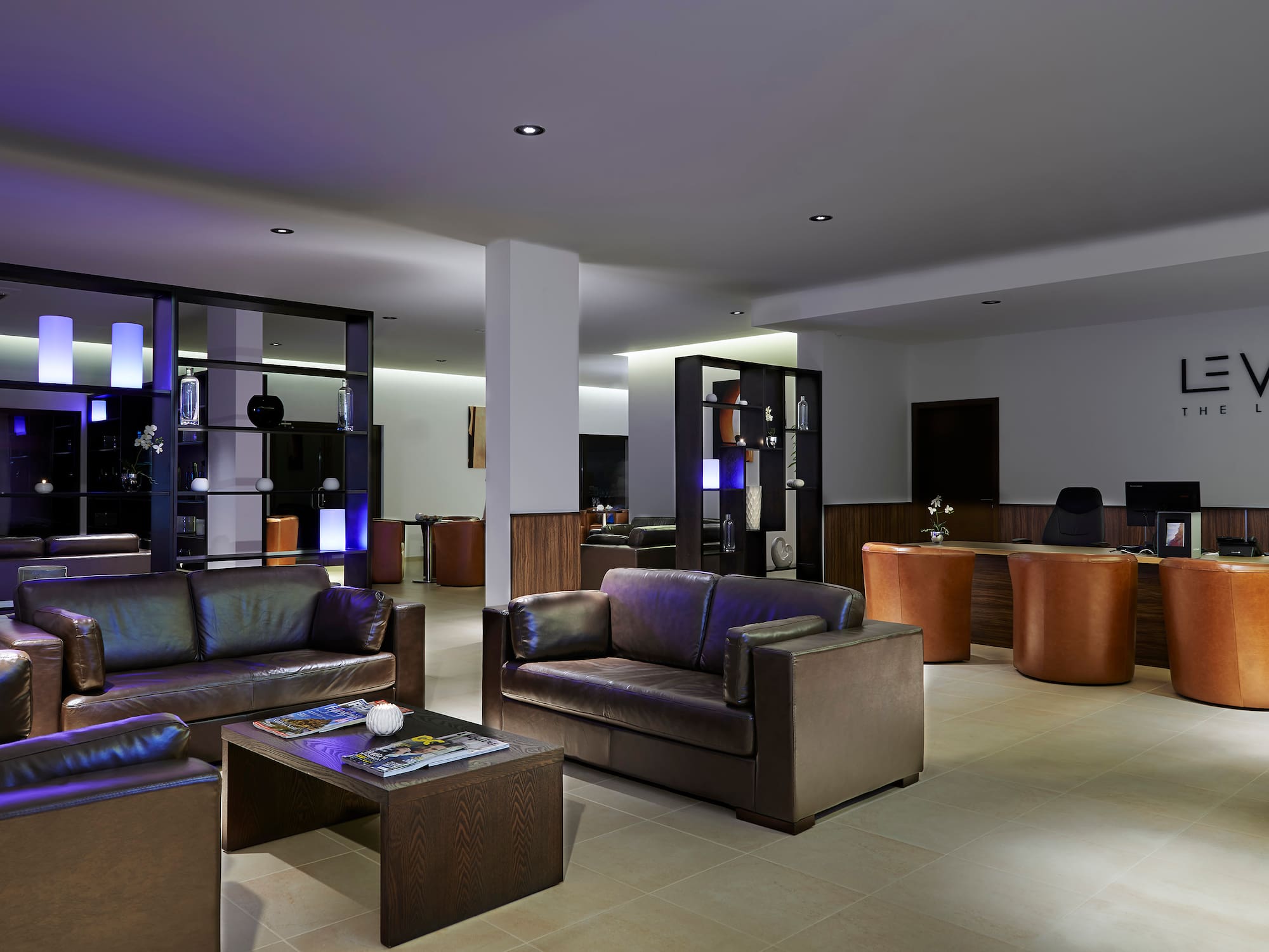 a room with couches and a table