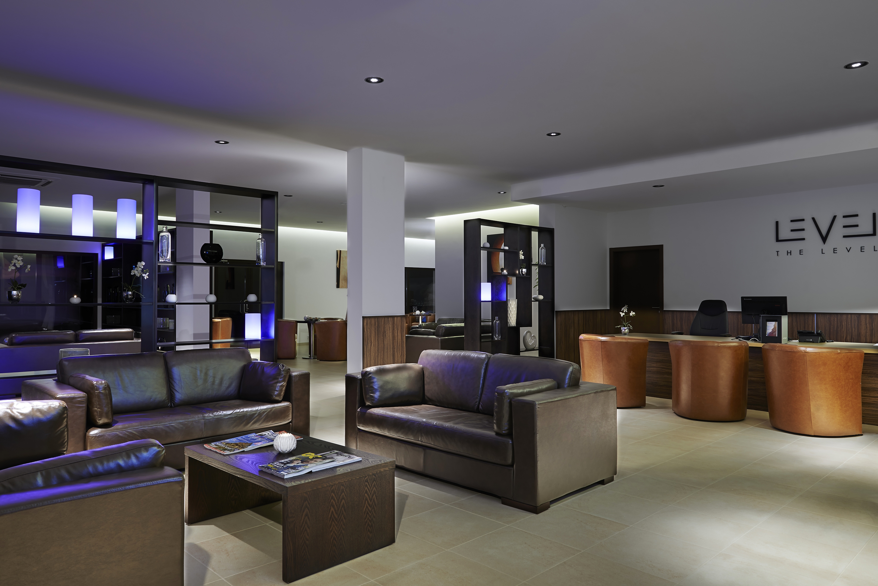 a room with couches and a table