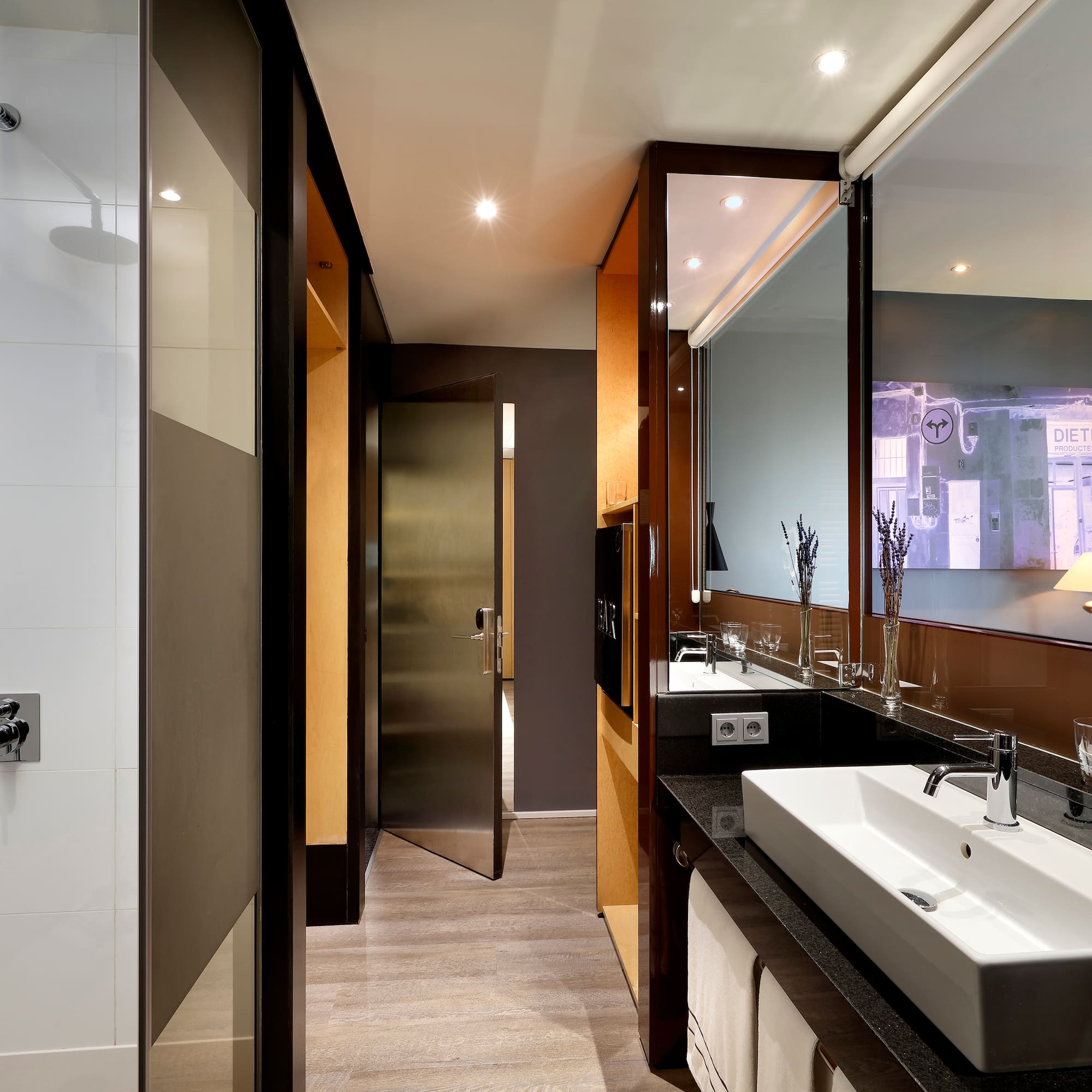 a bathroom with a sink and mirror