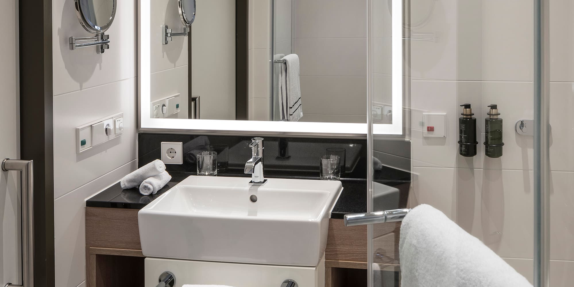 a bathroom with a mirror and sink