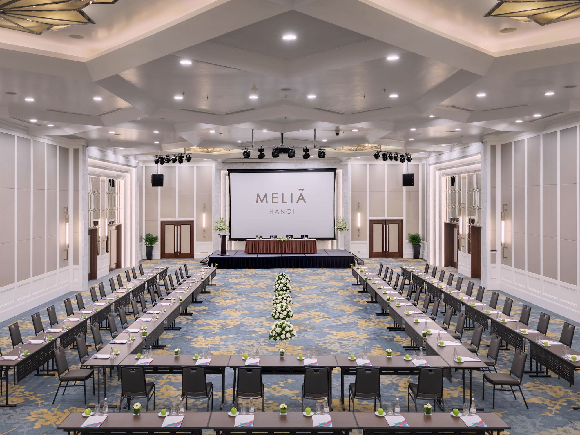 a large room with tables and chairs