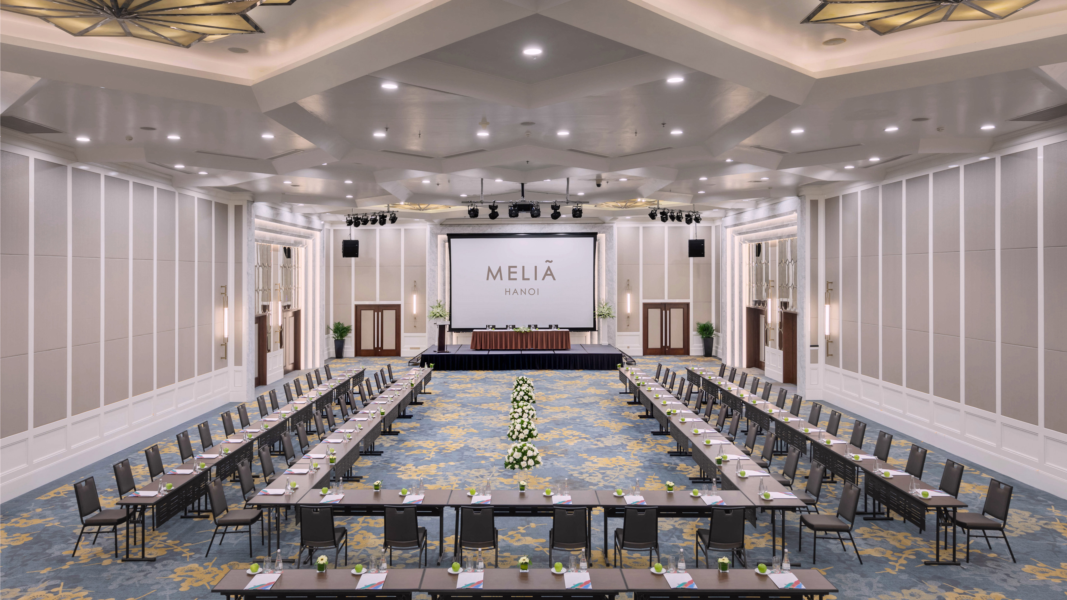 a large room with tables and chairs