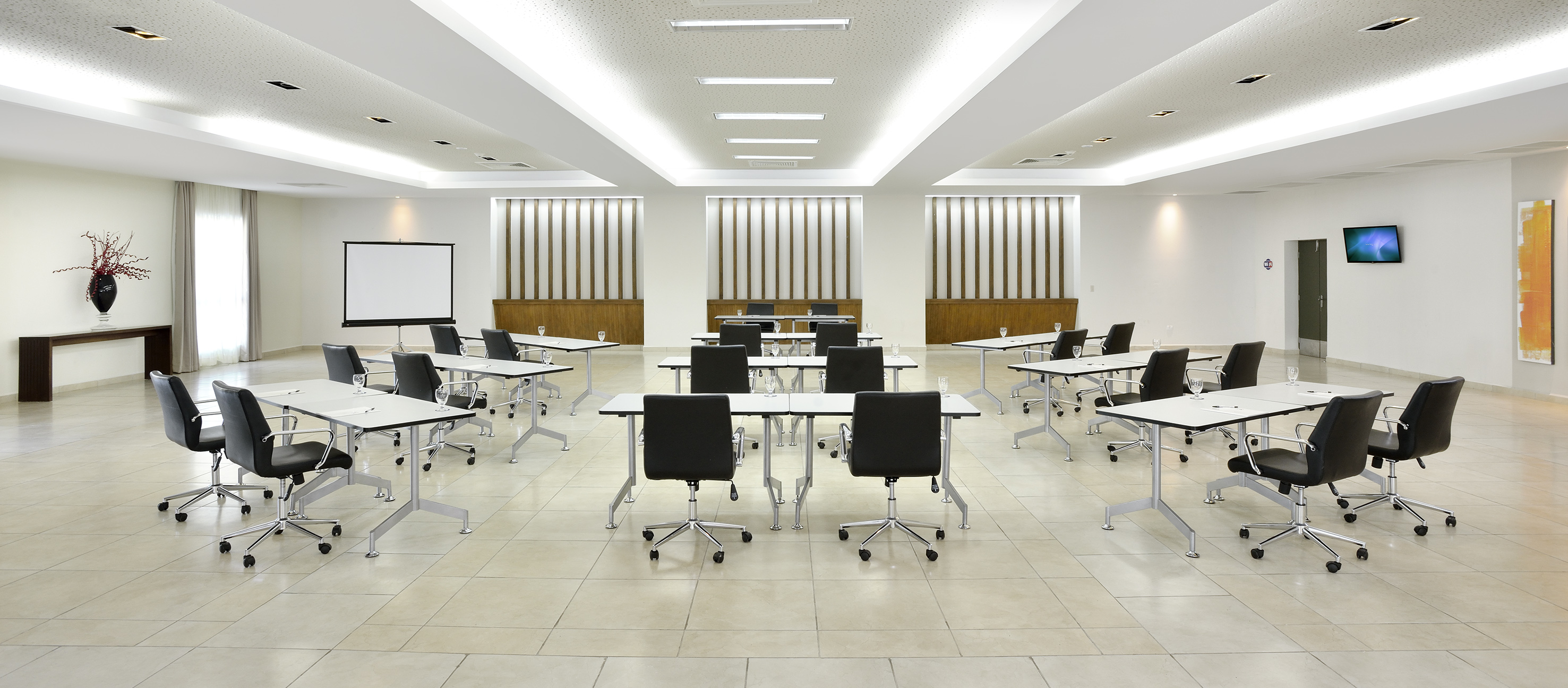 a room with tables and chairs