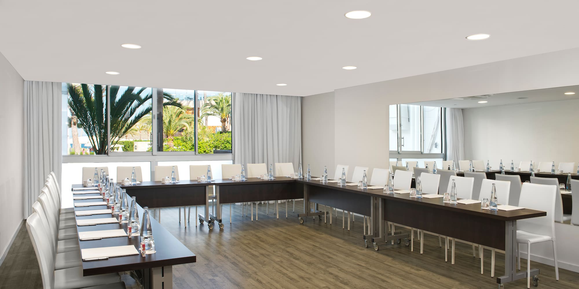 a room with tables and chairs