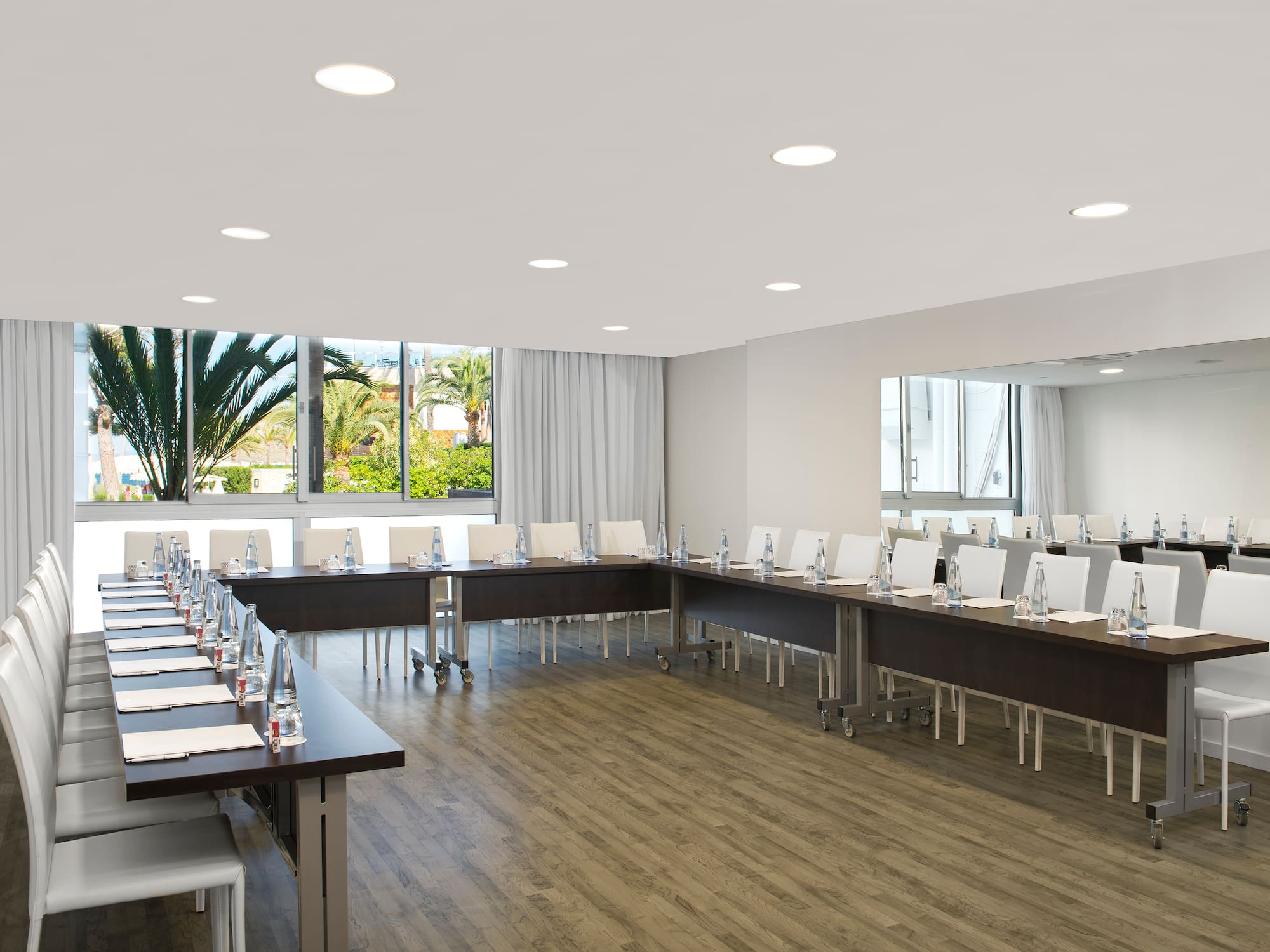 a room with tables and chairs