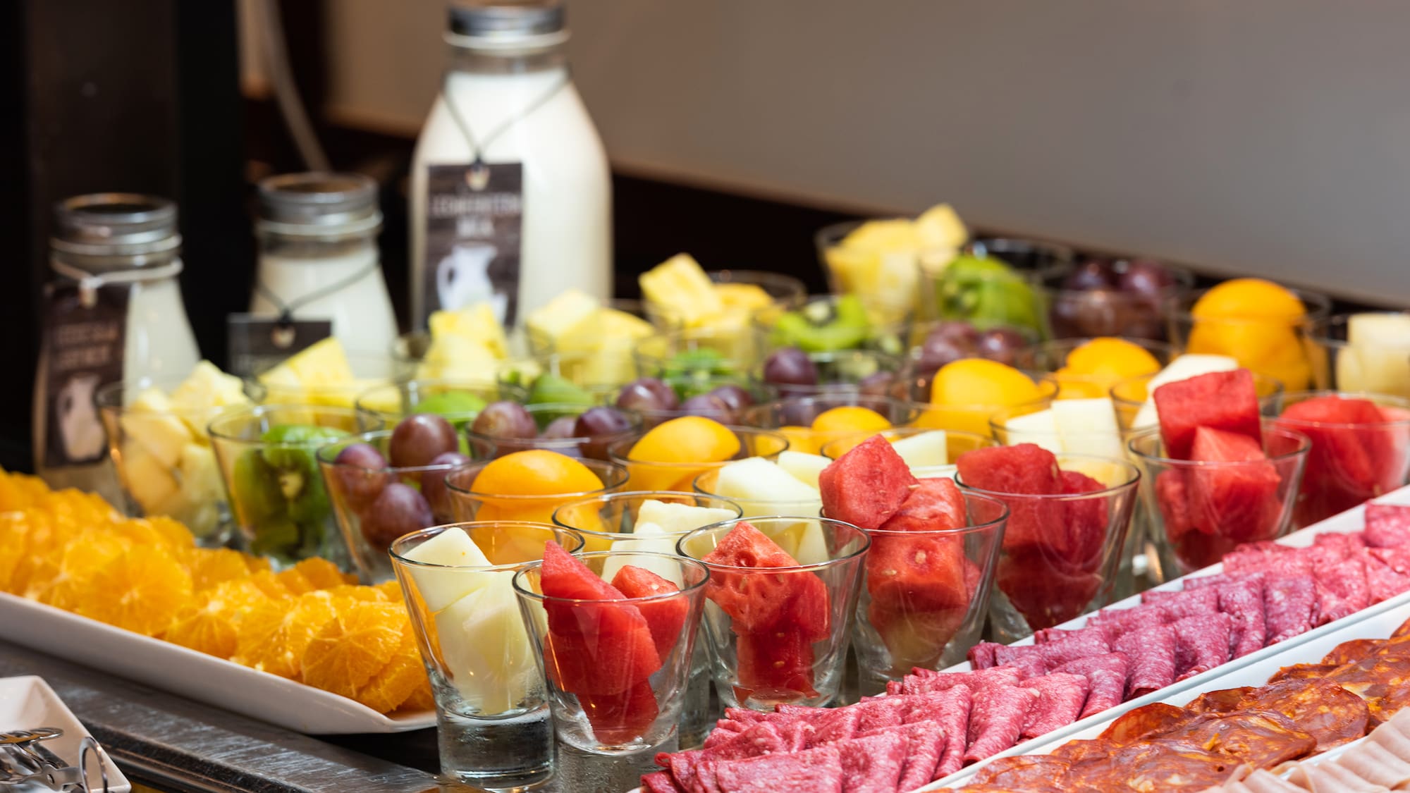 a table full of fruit and vegetables