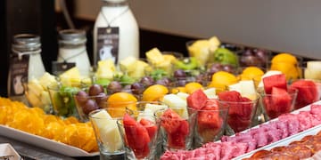 a table full of fruit and vegetables
