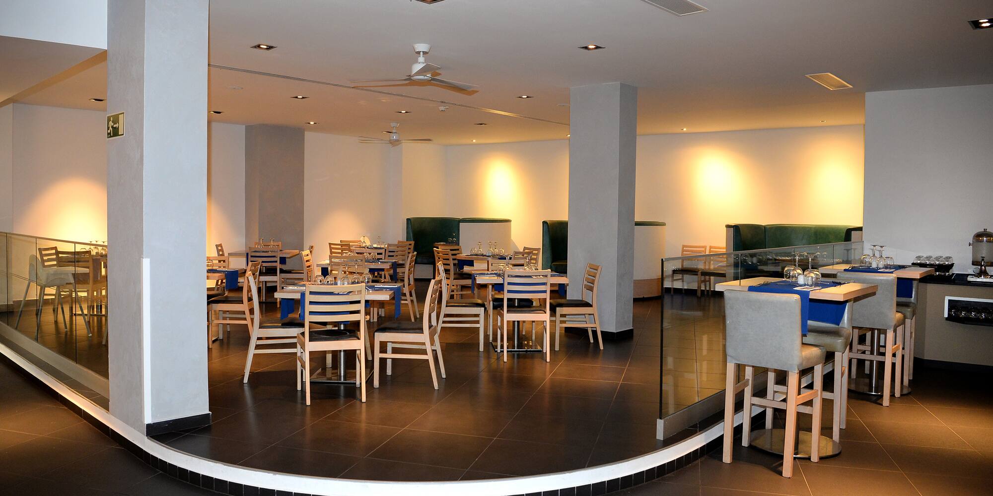 a room with tables and chairs