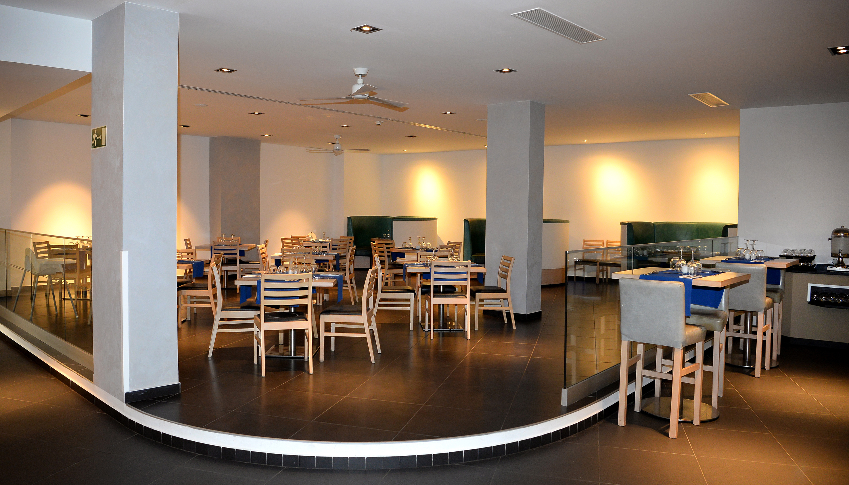 a room with tables and chairs