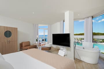 a room with a large television and a large window