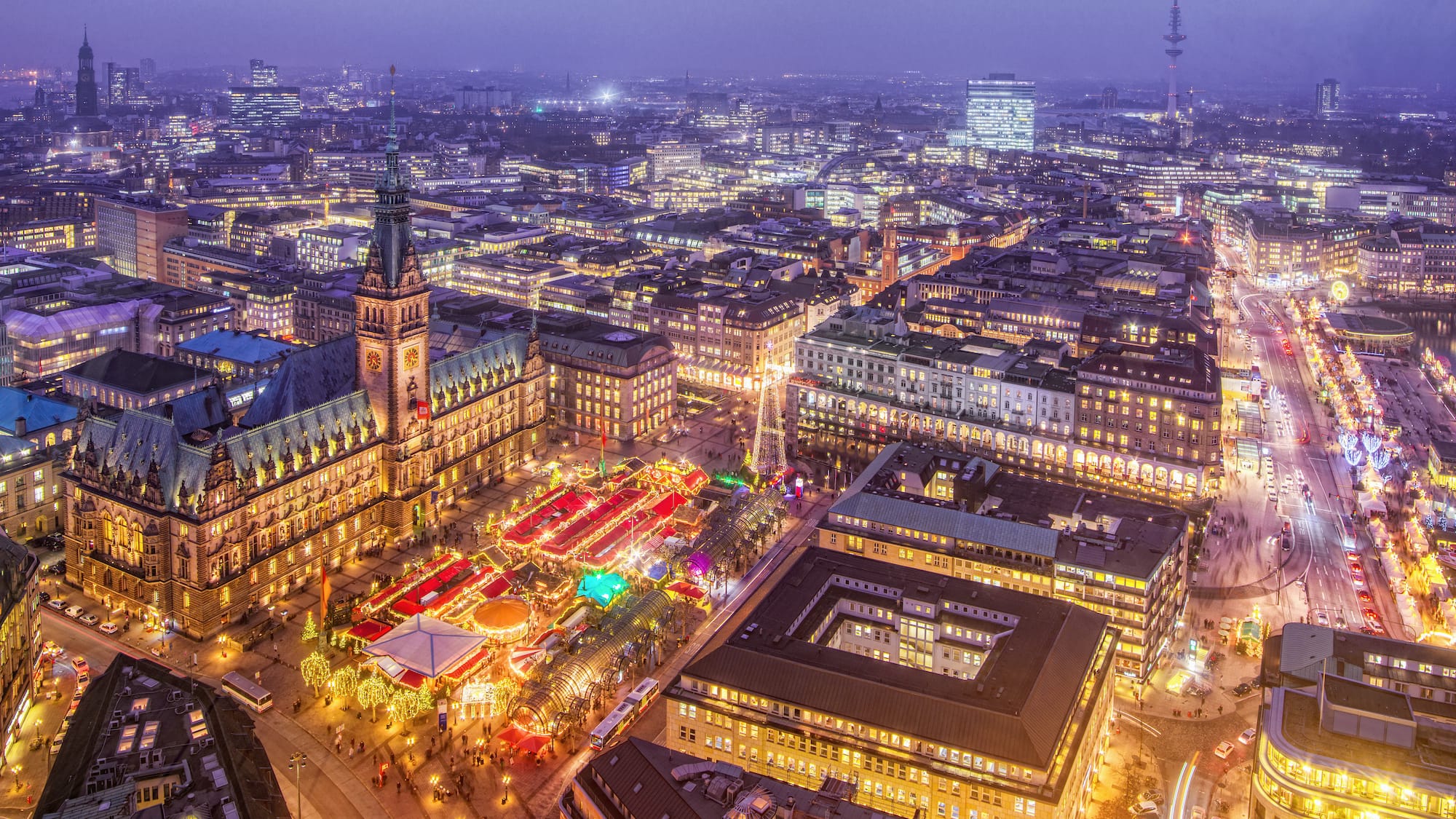 a city with lights and people