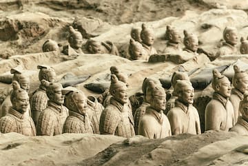 a group of clay statues